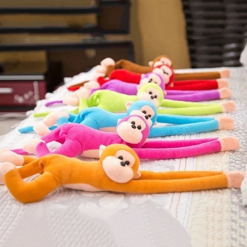 Peluche Mono Colgante Sonido 60cm Varios Colores