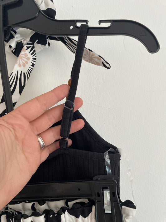 Conjunto Musculosa Pollera y Gomita de pelo talle 6