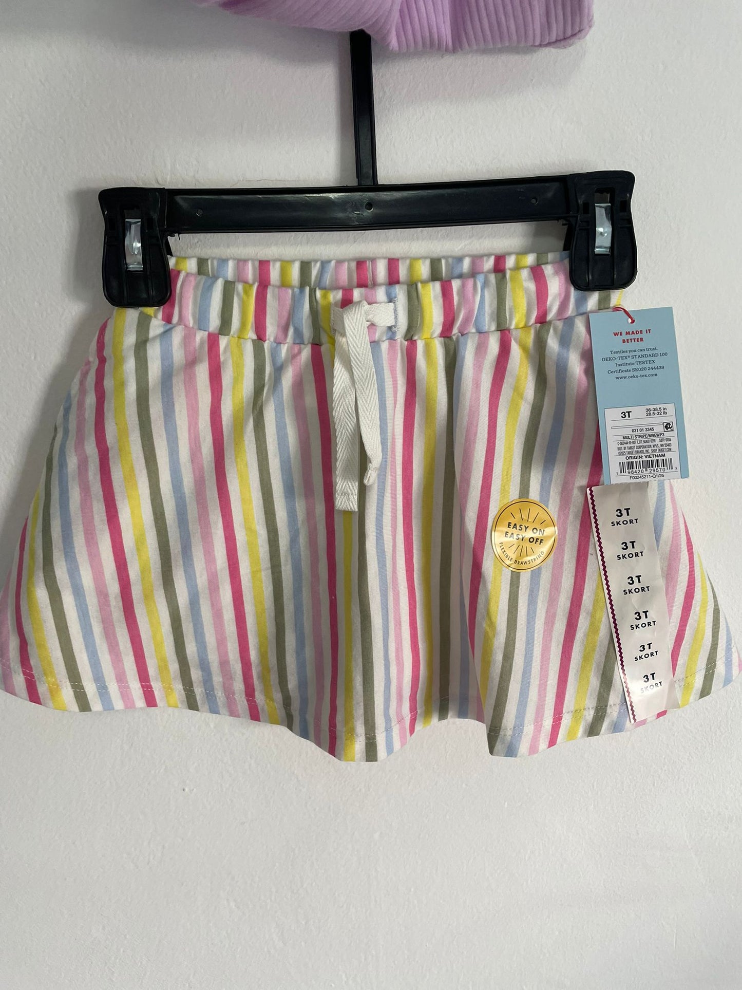 Conjunto Musculosa y Pollera con calza Niña talle 3