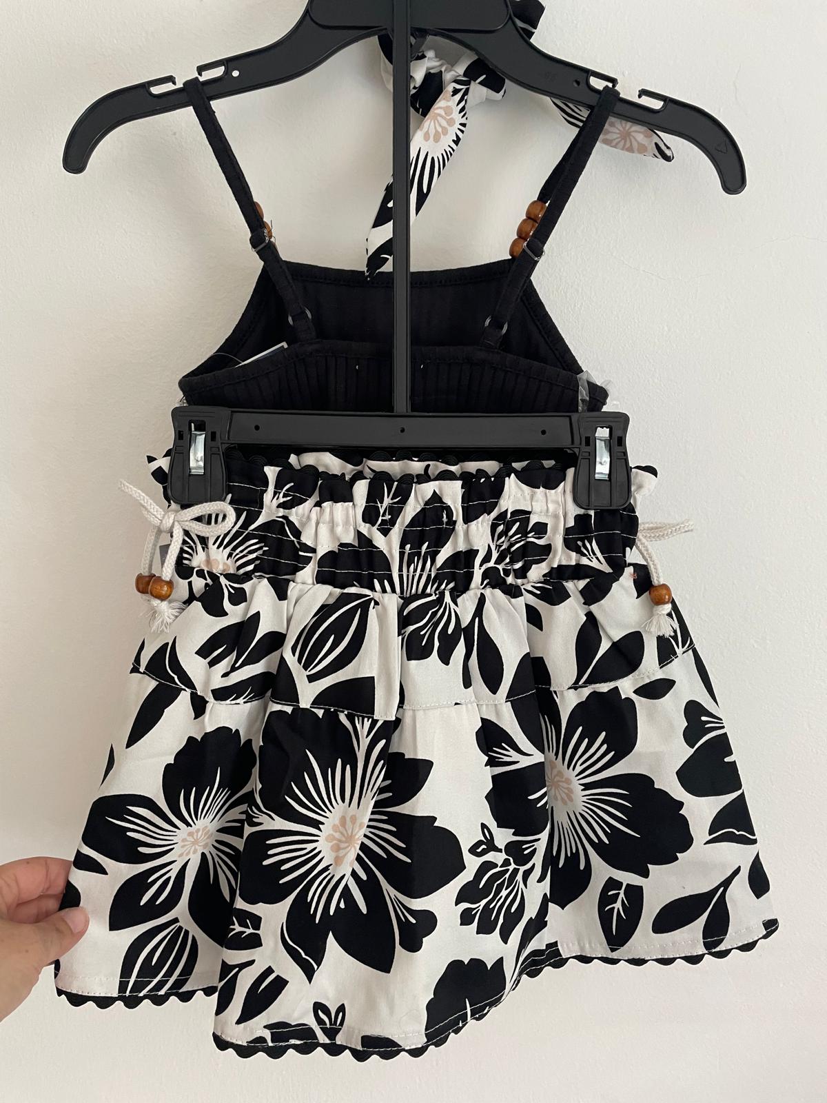 Conjunto Musculosa Pollera y Gomita de pelo talle 6